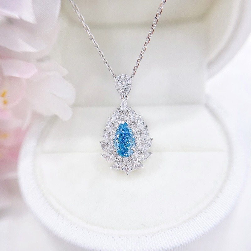18K Gold Blue Pear Cut L